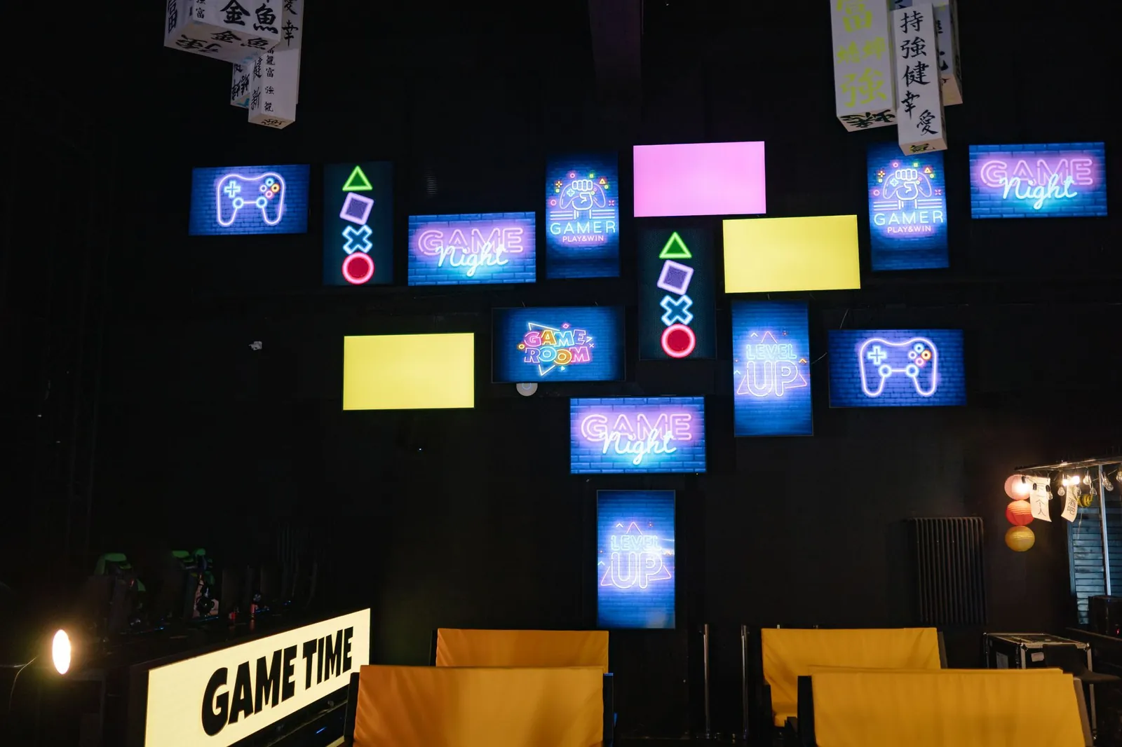 Dark game studio floor at night with rows of monitors, illustrating a launch-day analysis